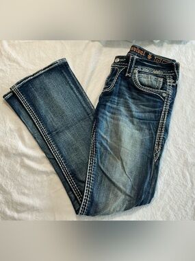 Rock Revival Boot cut Dark Blue, distresed Embroidered Stitch Jeans - Blue